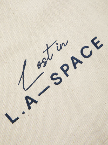 'LOST IN L.A-SPACE' EMBROIDERED TOTE BAG IN CREAM